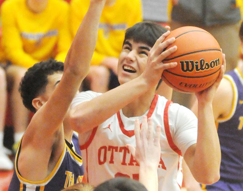 Ottawa's Payton Knoll eyes the basket in the home game against Mendota on Saturday, Jan. 14, 2023.