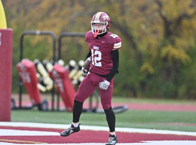 Morris Rj Kennedy (12) sores a touchdown during the class 4A second round playoff game against Metamora on Saturday, NOV. 08, 2025, at Morris.