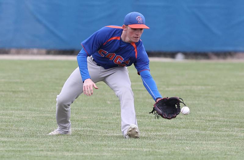 Genoa-Kingston's Ethan Wilnau fields a grounder in the outfield during their game against Rockford Lutheran Tuesday, May 2, 2023, at Genoa-Kingston High School.