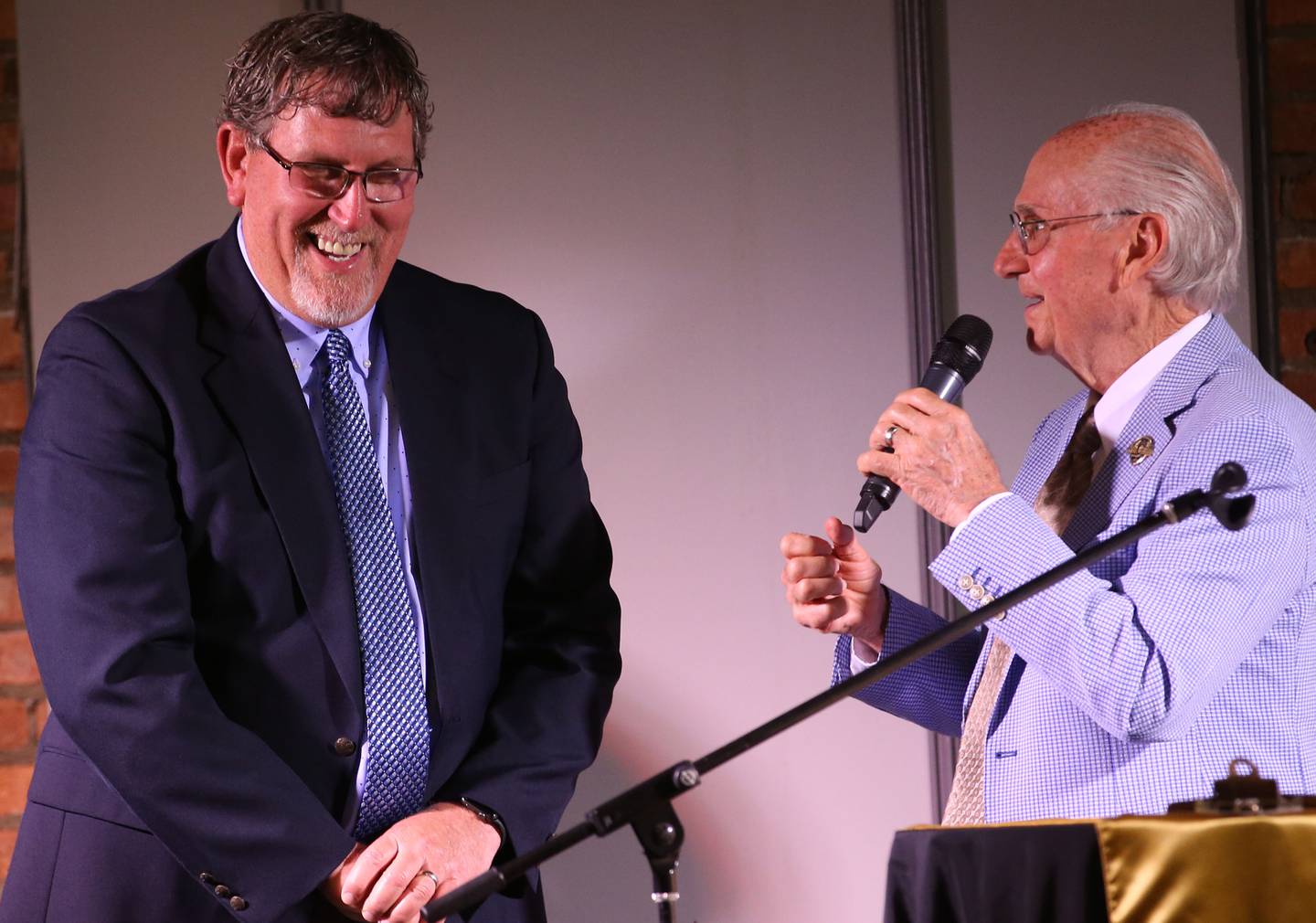 Brad Bickett smiles while being interviewed by Lanny Slevin Emcee during the Shaw Media Illinois Valley Sports Hall of Fame on Thursday, June 8, 2023 at the Auditorium Ballroom in La Salle. Bickett was the star player on the 1985-1986 Ohio basketball team who finished state runner-up.