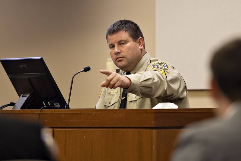 Ogle County sheriff's deputy Justin Diehl points to the defendant Wednesday, Aug. 20, 2025, during a hearing for Jodie Wiederkehr.