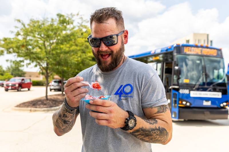 Eric Weis, Pace Assistant Division Manager Heritage-Plainfield Division, enjoys a snow cone at Activate Joliet on Aug. 3, 2024.