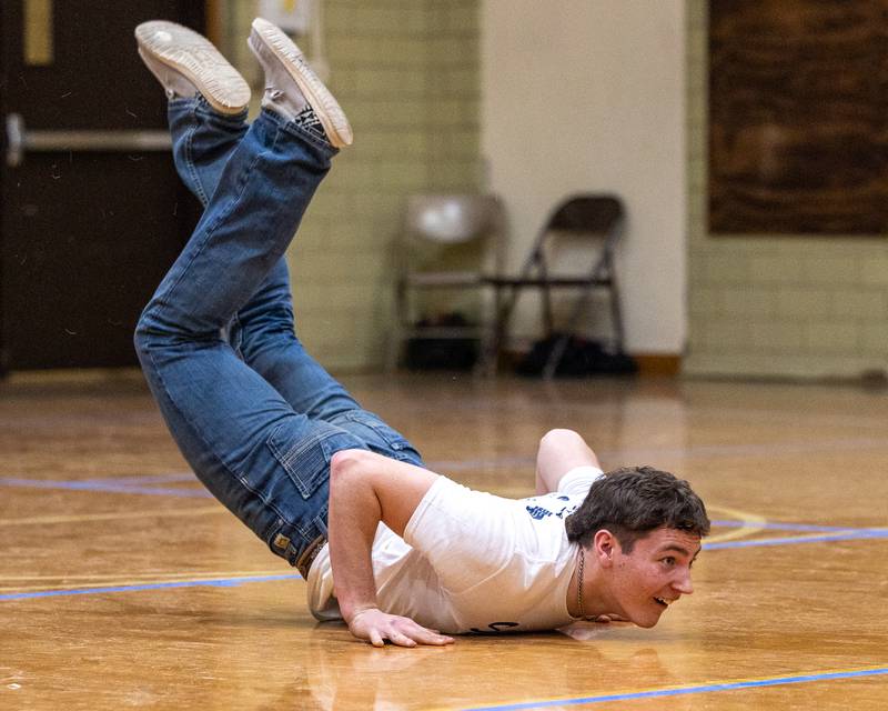 Joey Arnold does the 'worm' whilst competing in a tie-breaking dance-off after game of Donkey Basketball on Saturday, Feb. 7, 2026 at Seneca High School West Campus in Seneca.