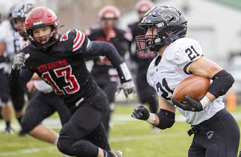 Le/Win’s Jake Zeal picks up yards Saturday, Nov. 12, 2022 in a quarterfinal game against Fulton.