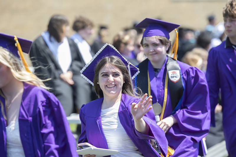 Dixon High School graduates leave the field and wave to loved ones after receiving their diplomas Sunday, May 24, 2026.