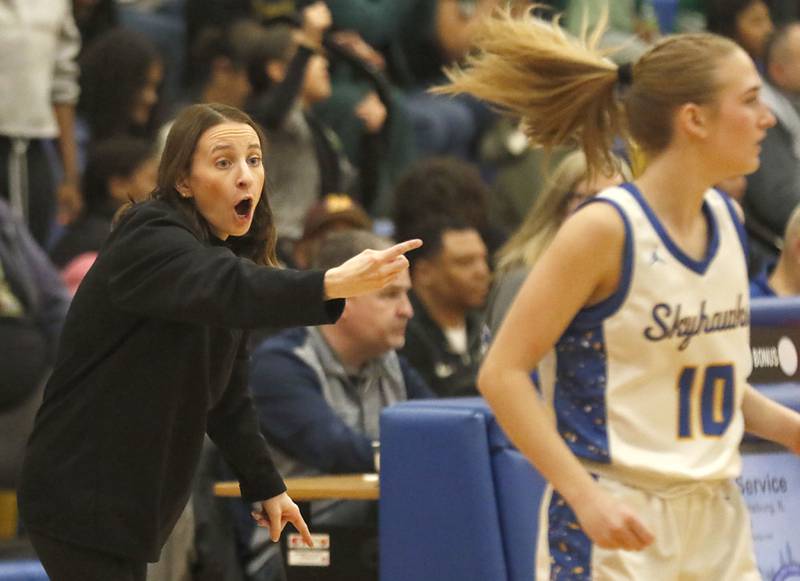 Johnsburg Head Coach Erin Stochl gives instructions to her team during the IHSA Class 2A Johnsburg Sectional girls basketball championship game against St. Edward on Thursday, February, 26, 2026, at Johnsburg High School.