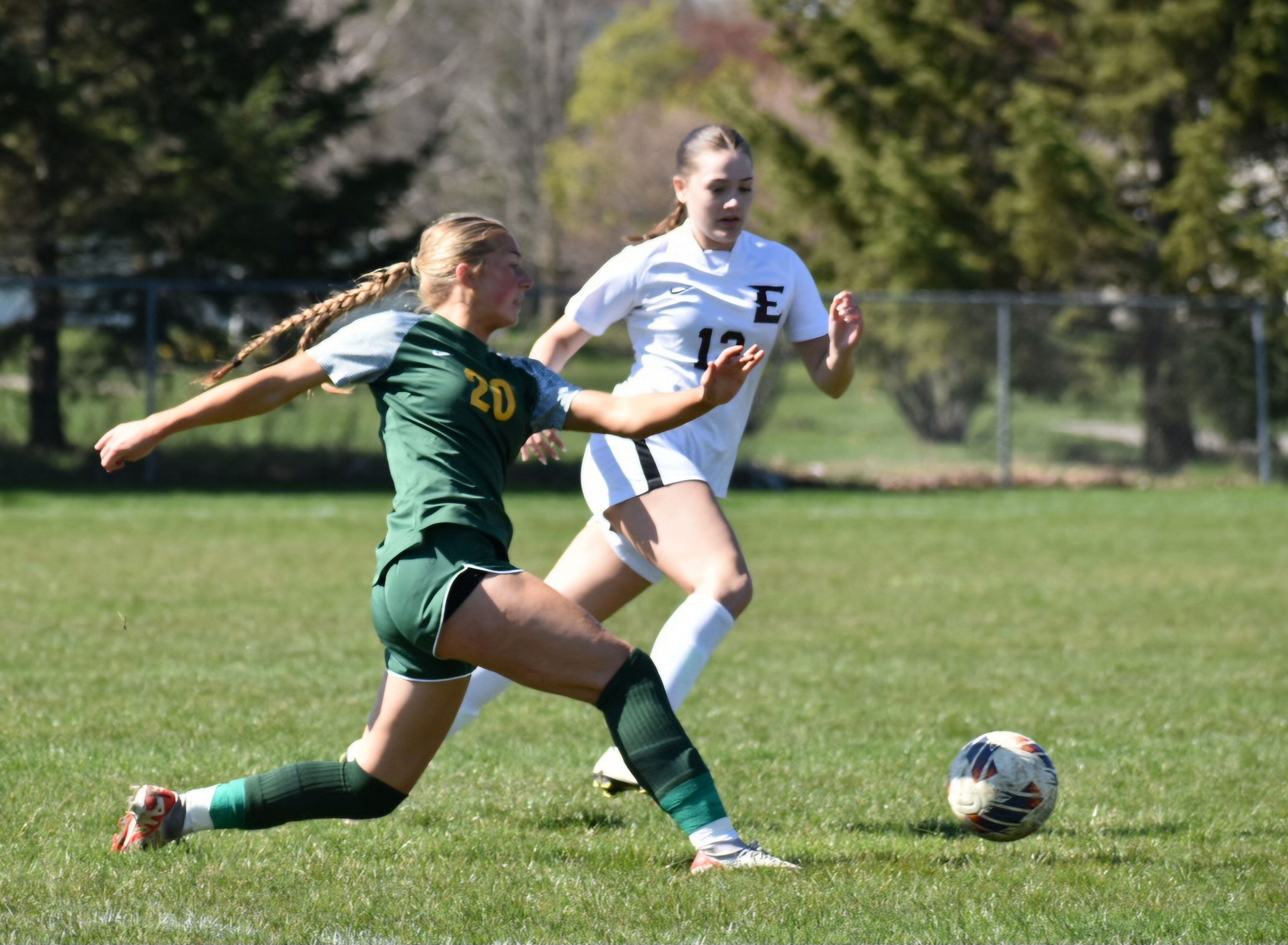 Crystal Lake South freshman Gracey LePage (20) tries to earn possession of the ball in a match this season. LePage has found success both on the pitch and the track for the Gators this season. Photo courtesy Tracey Bestmann