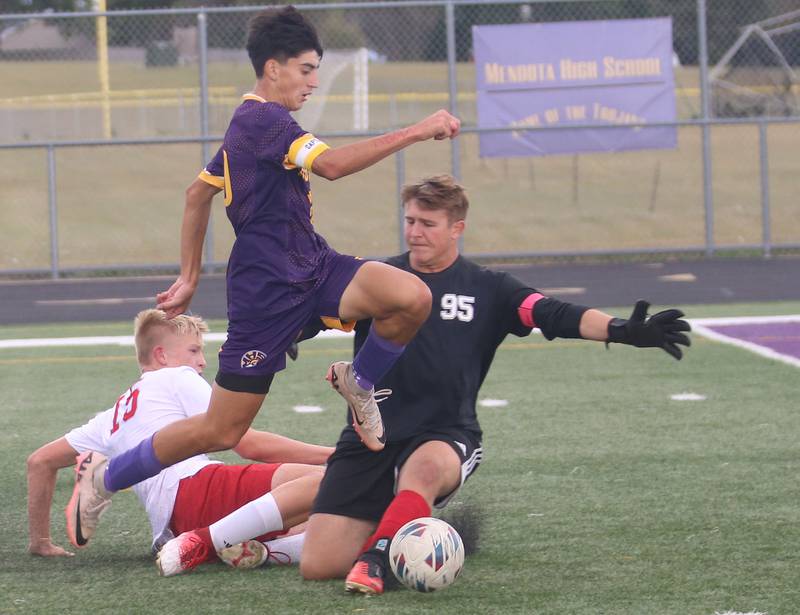 Mendota's Johan Cortez scores on this play over Streator keeper Andrew Vogel and teammate Joe Hoekstra on Monday, Sept. 23, 2024 at Mendota High School.