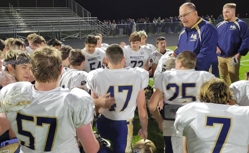 Marquette coach Tom Jobst praises his Crusaders following Friday's 40-7 victory over Sherrard.