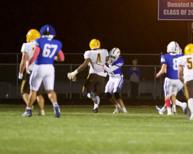 Jacobs Prince Barnes runs the ball into the end zone against Burlington Central 
on Friday, October 4,2024 in Burlington.