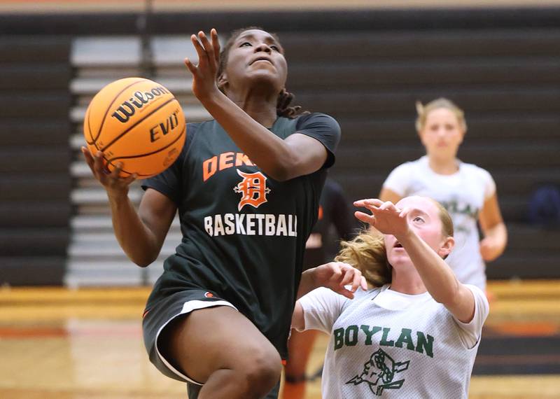 DeKalb’s Kezaria Mitchell goes up for a layup during their summer game against Boylan Monday, June 17, 2024, at DeKalb High School.