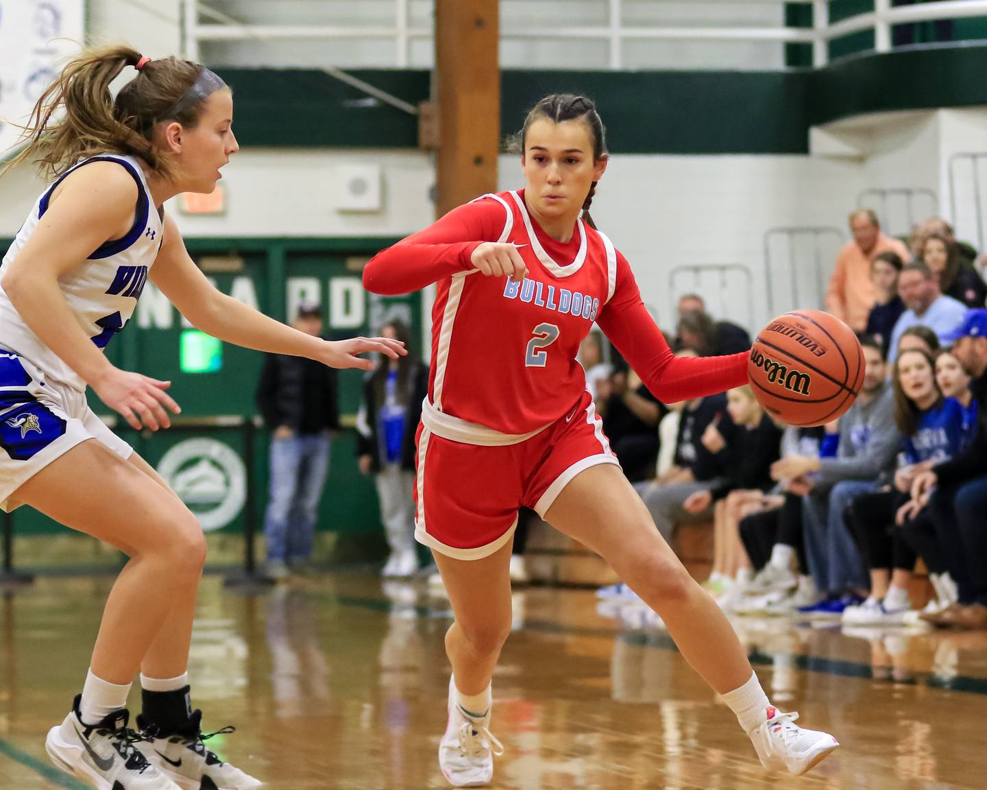 Batavia's Brooke CarlsonC (2) makes a move during Class 4A Glenbard West Sectional final game between Geneva at Batavia.  Feb 23, 2023.