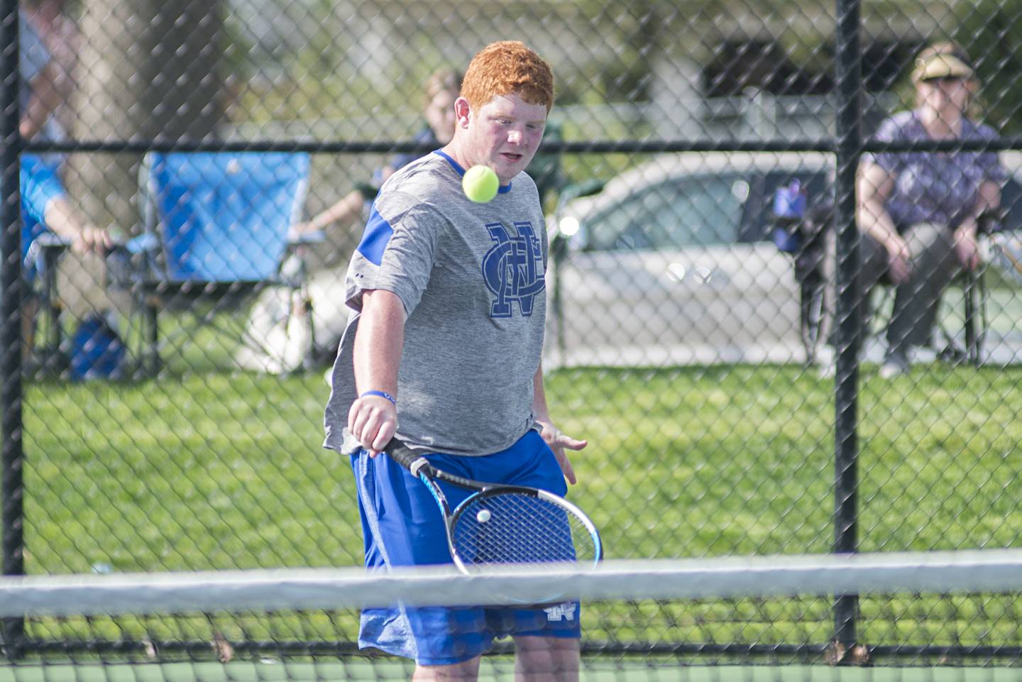 Newman’s James Rhodes returns a shot against Sterling’s Kayden Loos and Ben Boze Monday, May 9, 2022. Rhodes was playing with doubles partner Griffin Moran.