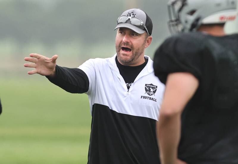 New Kaneland football head coach Mike Thorgesen talks to his defense during football practice Thursday, July 13, 2023, at the school in Maple Park.