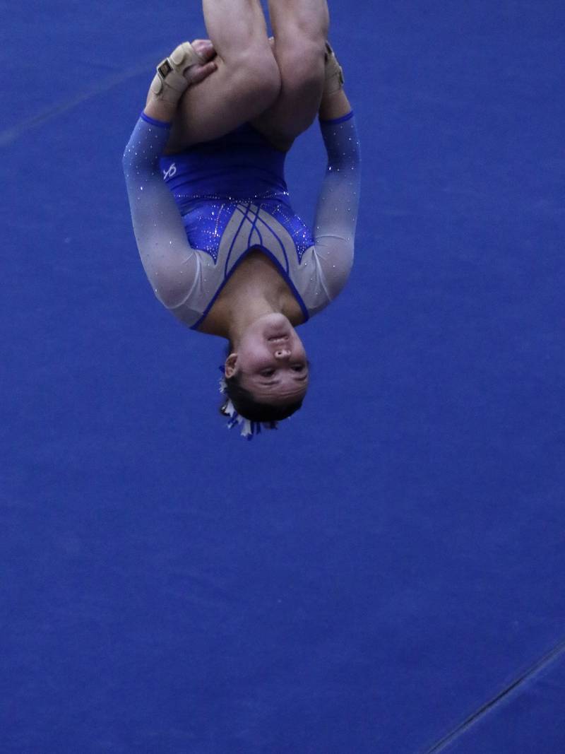 Vernon Hills’ Livy Tan competes in the preliminary round of the floor exercise on Friday, Feb. 21, 2025, during the IHSA Girls State Final Gymnastics Meet at Palatine High School.