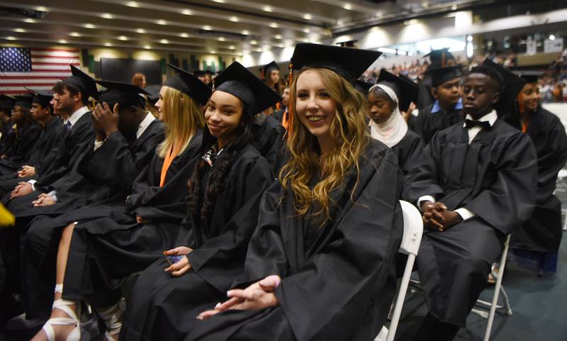 Joe Lewnard/jlewnard@dailyherald.com
Graduates are seated during the Wheaton Warrenville South High School graduation, held at the College of Dupage in Glen Ellyn Saturday.