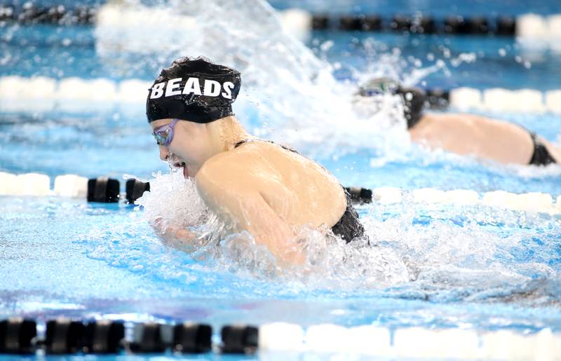Rosary’s Elizabeth Nawrocki swims the breastroke leg of the 200-yard medley relay championship heat during the IHSA Girls State Championships on Saturday, Nov. 16, 2024 at FMC Natatorium in Westmont.