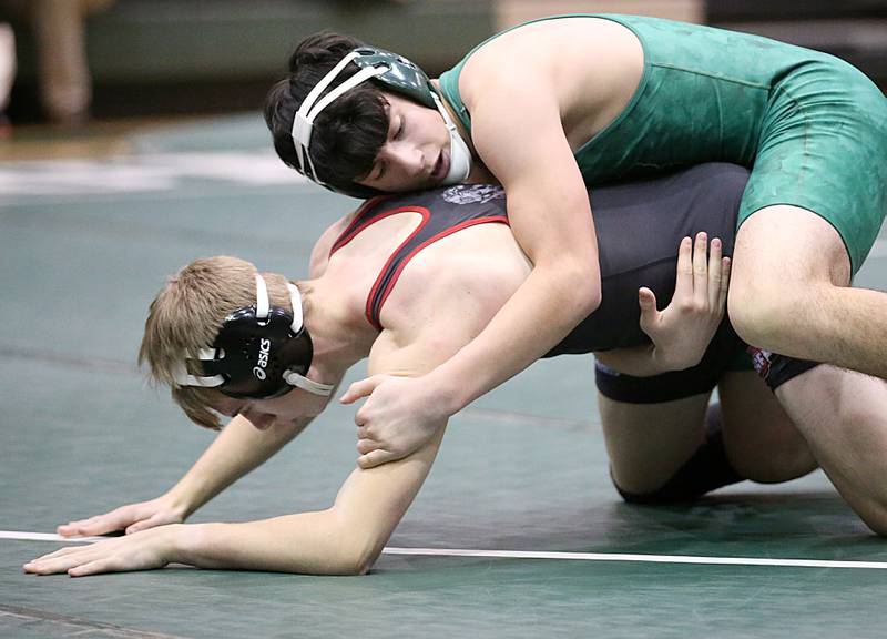 St. Bede's Logan Pineda wrestles Orion's Cash Duhs during a triangular meet on Wednesday, Jan. 18, 2023 at St. Bede Academy.