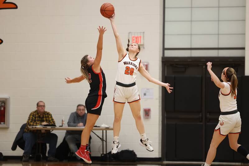 Lincoln-Way West’s Ava Alton knocks away a pass against Lincoln-Way Central on Tuesday, February 7th..