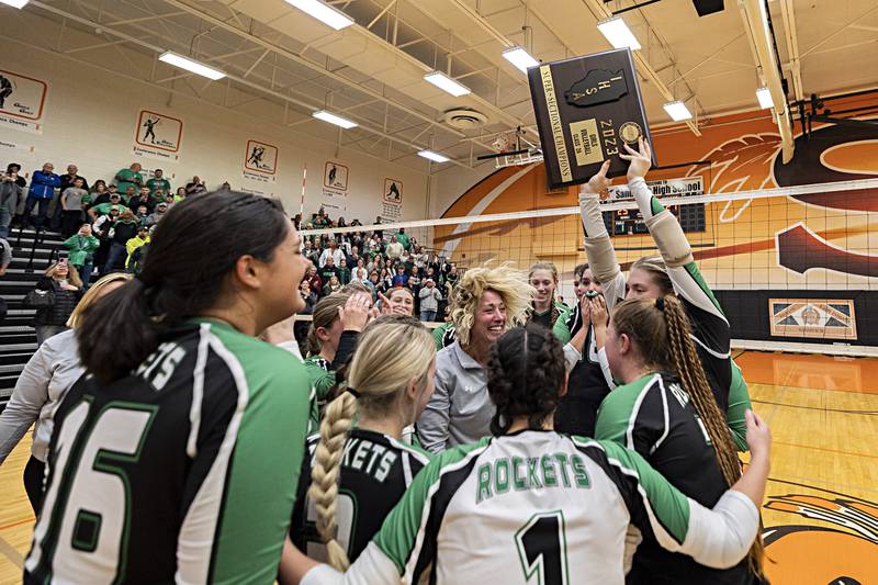 The Rock Falls volleyball team celebrates after beating Chicago Christian in two sets Friday, Nov. 3, 2023 in the class 2A volleyball supersectional in Sandwich.