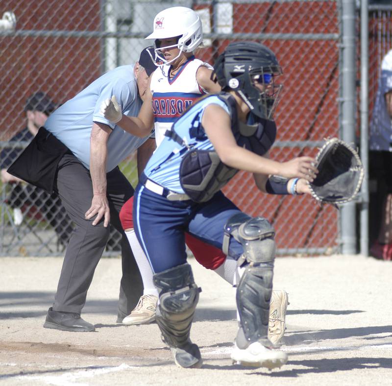 Bureau Valley catcher Emily Wright awaits a throw as a Morrison player scores. The Bureau Valley Storm traveled to Morrison for a game against the Fillies on Friday, May 9th, 2025.