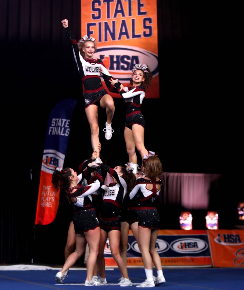 Members of the Prairie Ridge cheerleading team compete in the medium team division of the IHSA State Finals on Saturday, Feb. 8, 2025 at Grossinger Motors Arena in Bloomington.