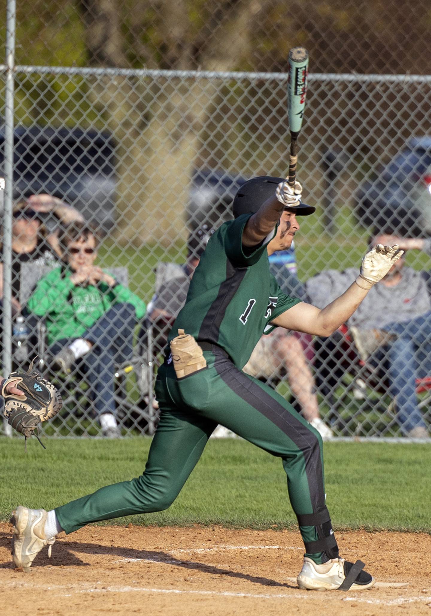 Rock Falls’ Austin Castaneda drives in two with a double against Newman Wednesday, April 23, 2025.