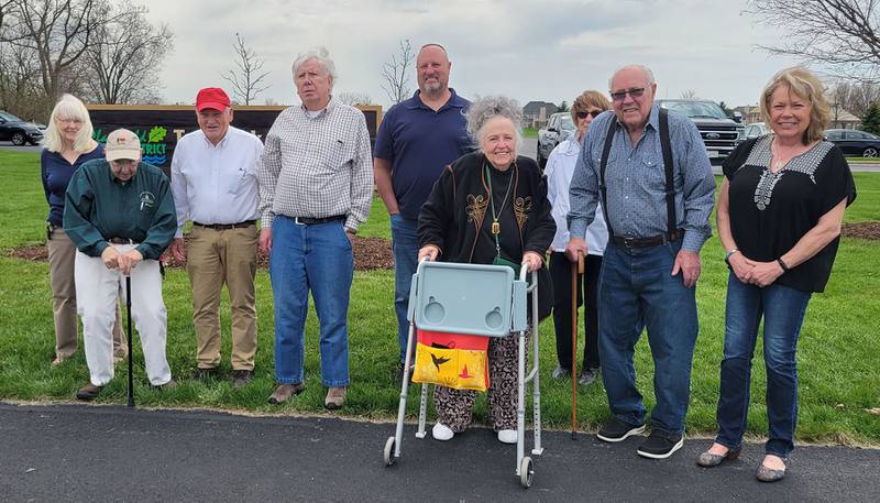 Attending the sign unveiling were descendants of some of Plainfield's earliest residents. (From left) Sue Matile, Roger Matile, Tom Gilmour, James King, Joel Craig, Carolyn McMicken Mauer, Ann King, Wyllie McMicken and daughter Margo McMicken.