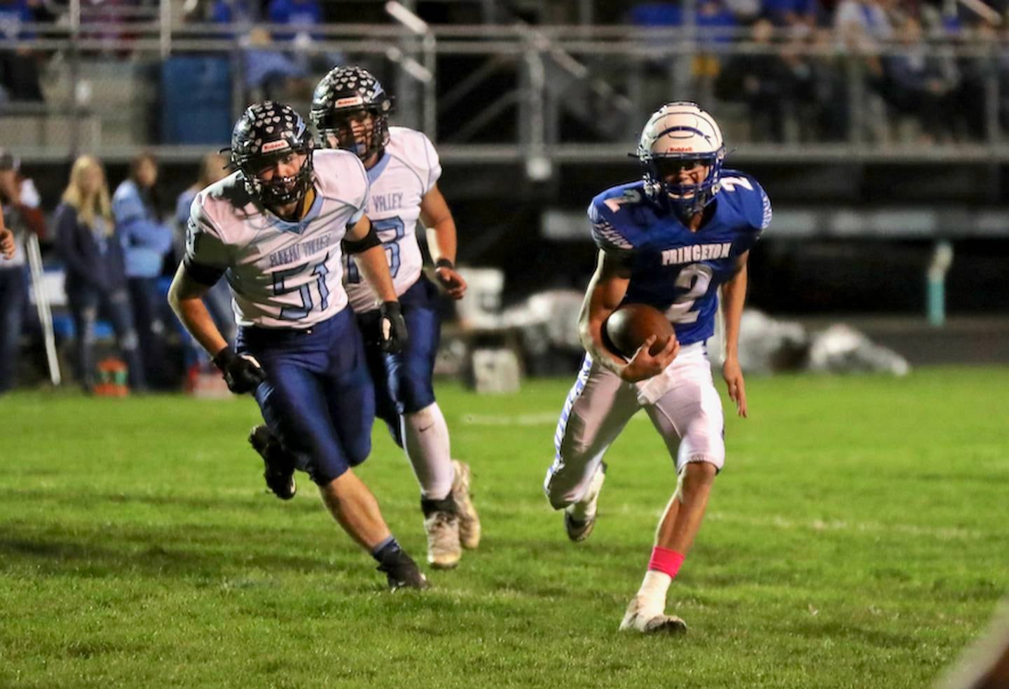 Princeton quarterback Teegan Davis takes off for a run against Bureau Valley Friday night.