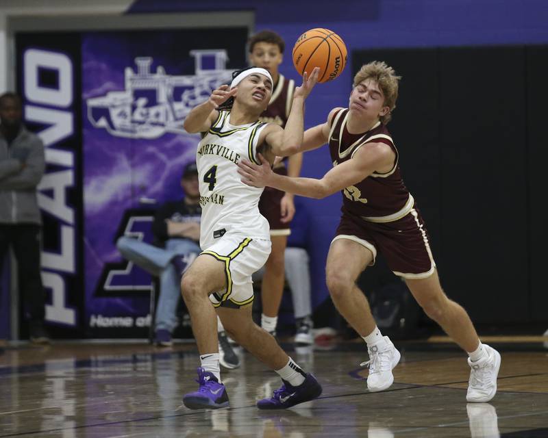 Yorkville Christian's Tray Alford (4) fights for a loose ball during their Plano Christmas Classic basketball game between Morris at Yorkville Christian Friday, Dec 26, 2025 in Plano.
