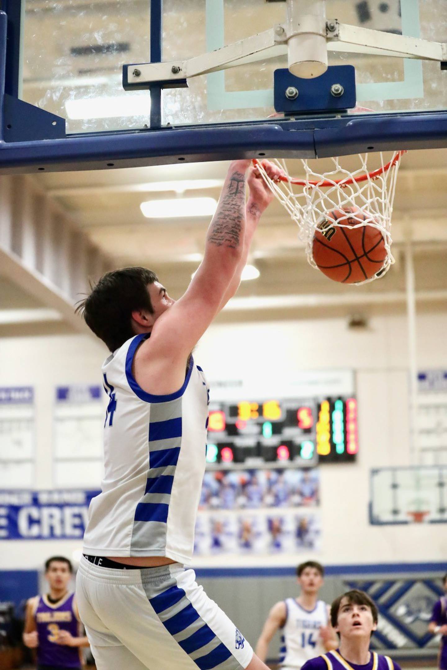 Princeton's Kolten Monroe throws down a dunk against Mendota Friday night at Prouty Gym