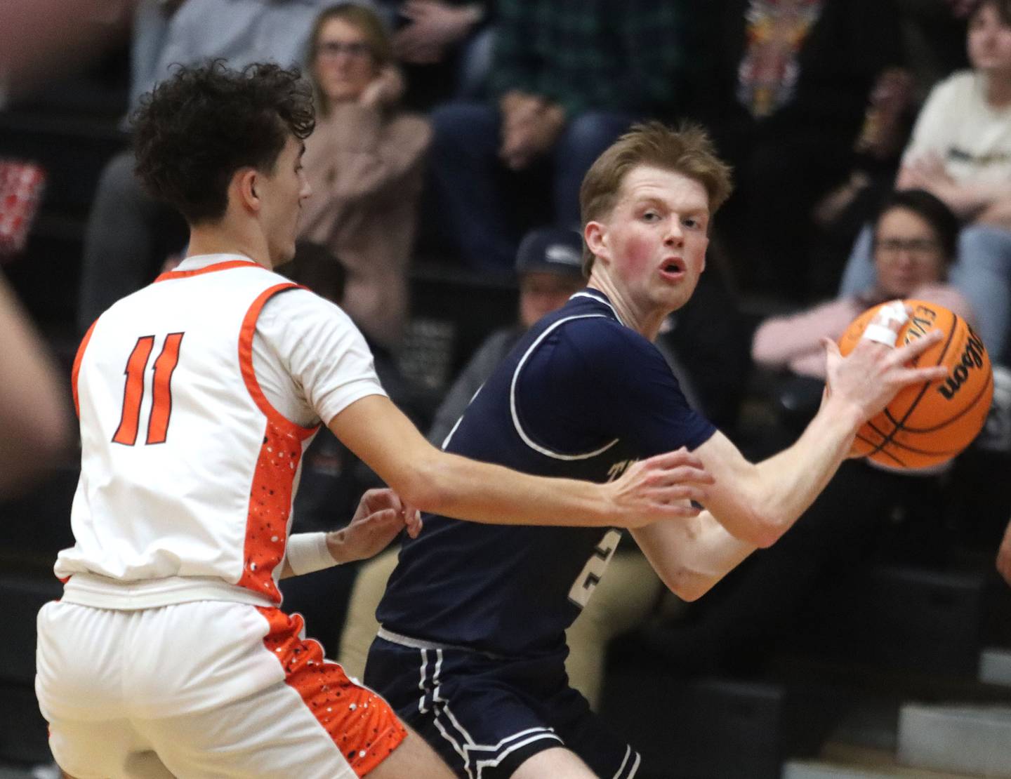 Cary-Grove’s AJ Berndt looks for an option in varsity boys basketball on Tuesday, Feb. 17, 2026, at McHenry High School in McHenry.