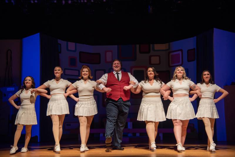 Emma Woulfe, Brittan Bradley, Ivy Soens, Kevin J, Alleman, PJ Fulkerson, Kylie Atkins and Amilia Sanchez perform “Live in Living Color,” a musical number, in a rehearsal of Engle Lane's performance of "Catch Me If You Can."