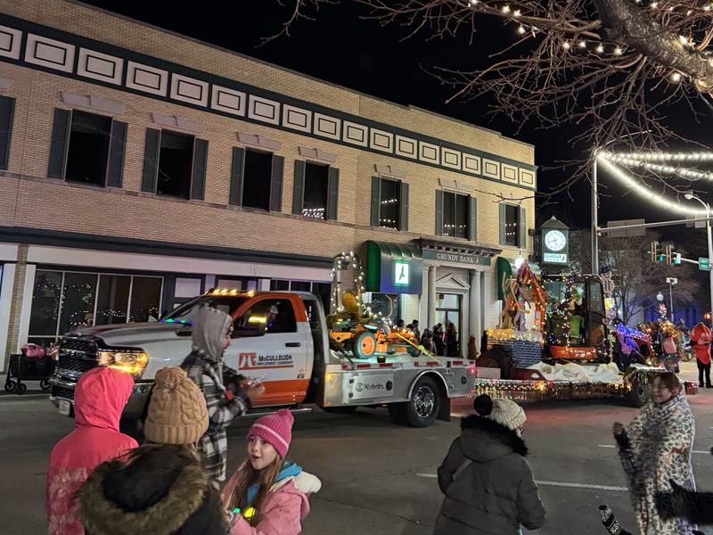 McCullough Implement Company's decorated equipment makes it's way down Liberty Street during the annual Lighted Holiday Parade on Friday, Nov. 28, 2025.
