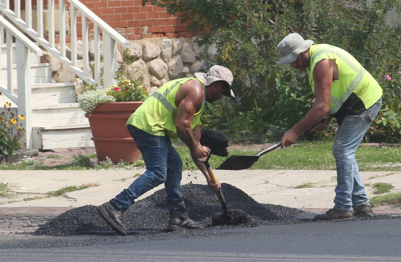 Crews with Advanced Asphalt pave the entrance to the Princeton Train Depot on Monday, Aug. 5, 2024. In May, The Princeton City Council approved a $542,952 agreement with Advanced Asphalt to complete the work.The parking lot is expected to open later this month.