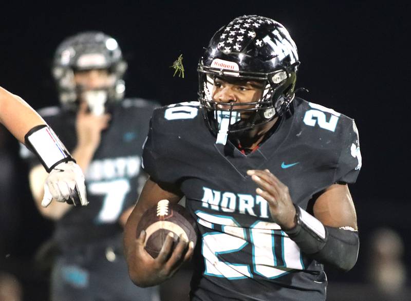 Woodstock North’s David Randecker runs the ball against Woodstock in varsity football at Woodstock North High School on Friday, October 24, 2025.