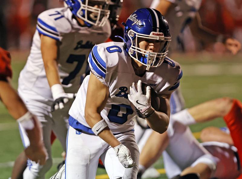 Riverside Brookfield's Jacob Retana (0) runs during the varsity football game between Riverside Brookfield and Glenbard East on Friday, Oct. 24, 2025 in Lombard, IL.