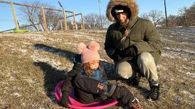 PHOTOS: Florida family hits Morrison sledding hill