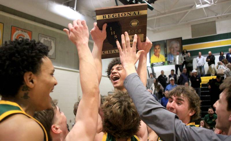Crystal Lake South’s Gators celebrate a win over Cary-Grove in boys IHSA Class 3A Regional Championship basketball on Friday, Feb. 27, 2026, at Crystal Lake South High School in Crystal Lake.