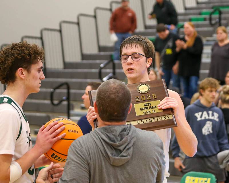 Bishop Mcnamara celebrates their win over Yorkville Christian for the Class 2A Seneca Sectional title, March 6, 2026 in Senaca.