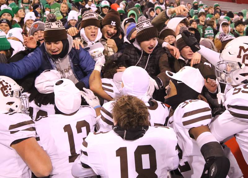 Mt. Carmel players celebrate with their fans after their Class 8A state championship win over Batavia Saturday, Nov. 30, 2024, in Hancock Stadium at Illinois State University in Normal.