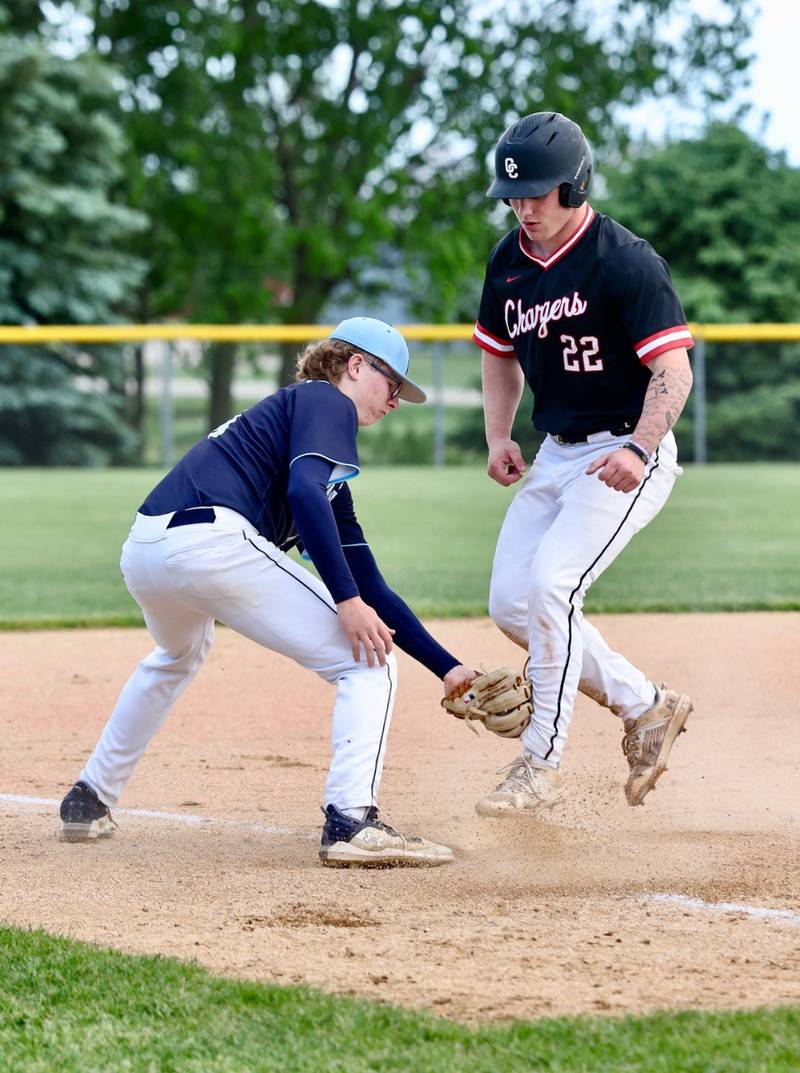 Bureau Valley's Drake Taylor puts the tag on Orion's Maddux Anderson at third base in Thursday's regional semifinal game at Manlius. Orion won 6-0.
