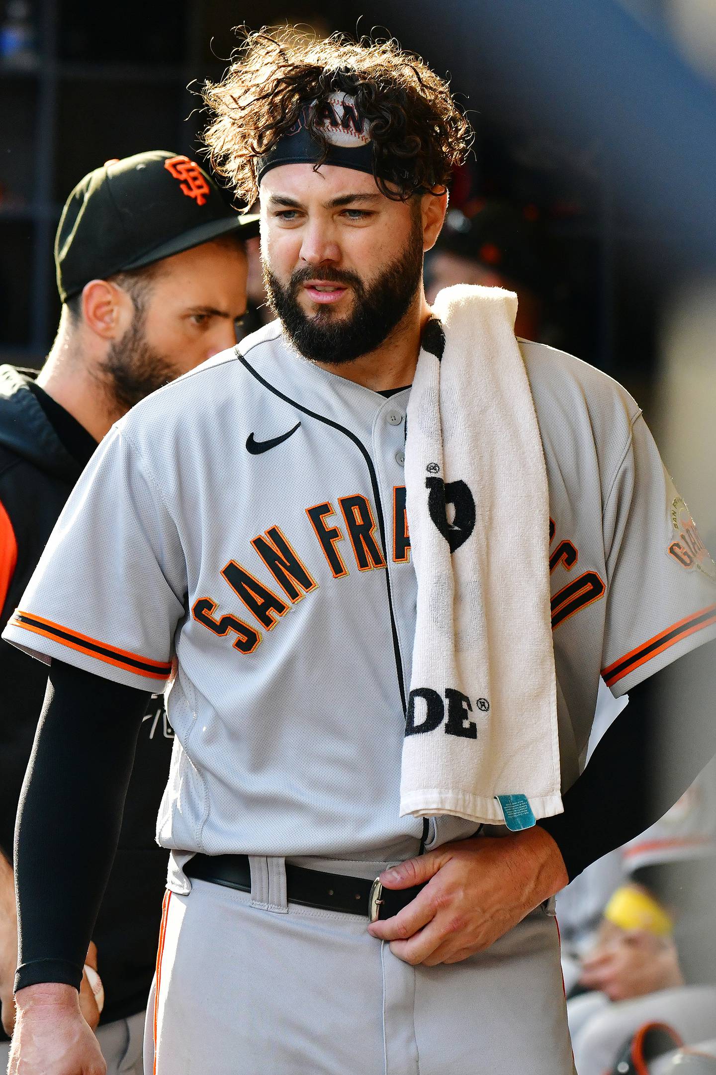 Giants starter Jakob Junis stands in the dugout during a game against the Brewers on Thursday, Sept. 8, 2022. The Rock Falls native has had a solid season in his first year with San Francisco.
