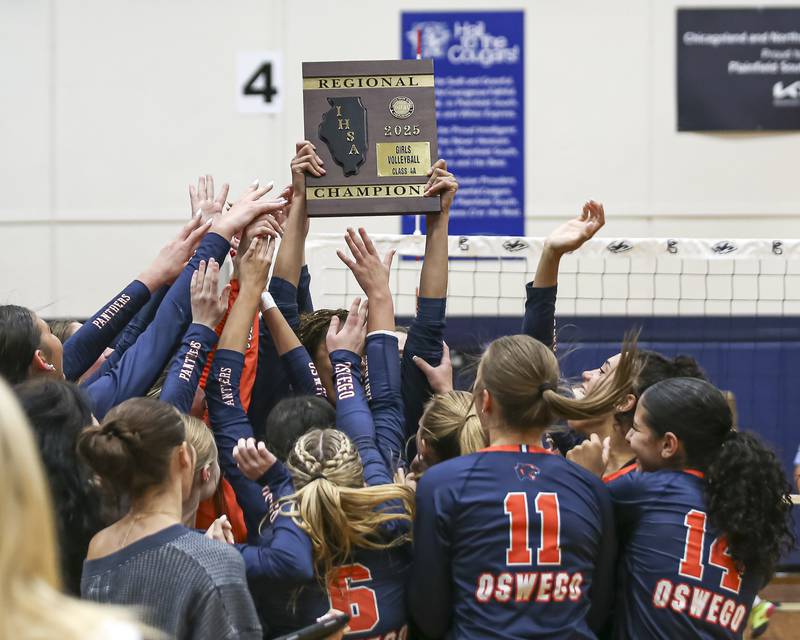 Oswego celebrates their victory over Neuqua Valley in their Class 4A Regional Final volleyball match between Neuqua Valley at Oswego.  Oct 30, 2025 in Plainfield.