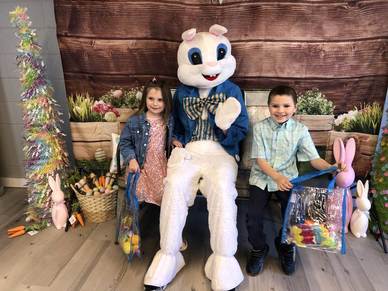 Robby Kolberg, 8, and Dahlia Kolberg, 6, of Marengo visit with the Easter bunny at the Huntley Area Chamber of Commerce scavenger hunt March 29, 2024.