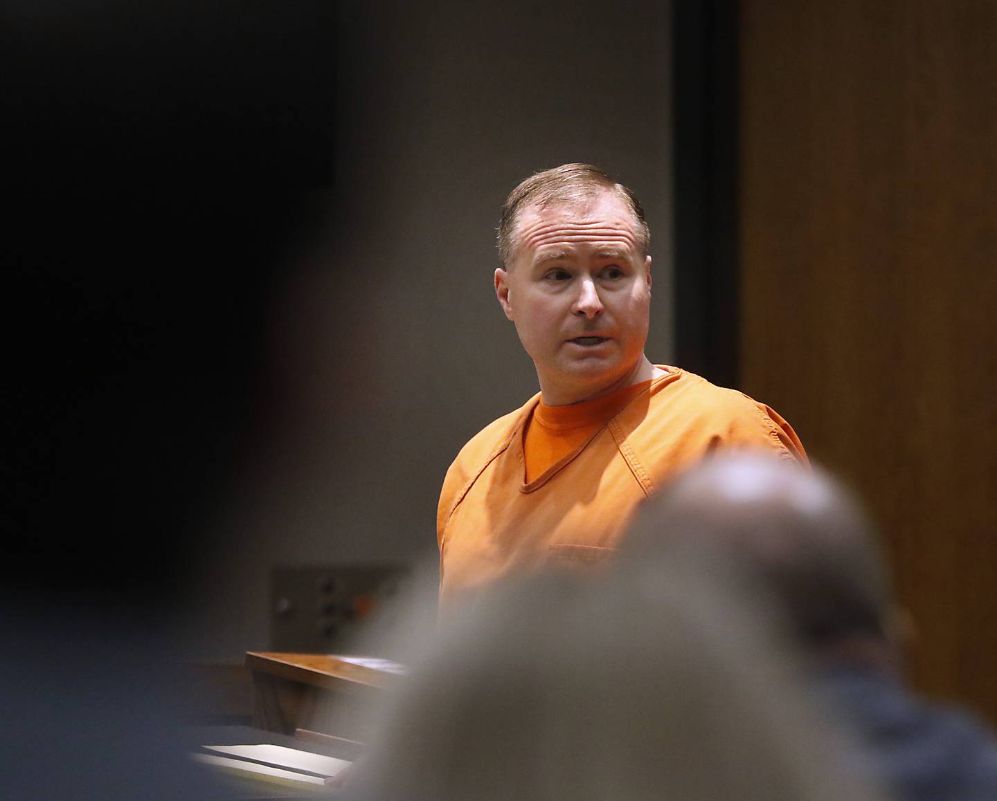 William Bishop looks back at the people in the gallery as he speaks during his sentencing hearing before McHenry County Judge Michael Coppedge on Thursday, Jan. 26, 2023, in the McHenry County courthouse in Woodstock.