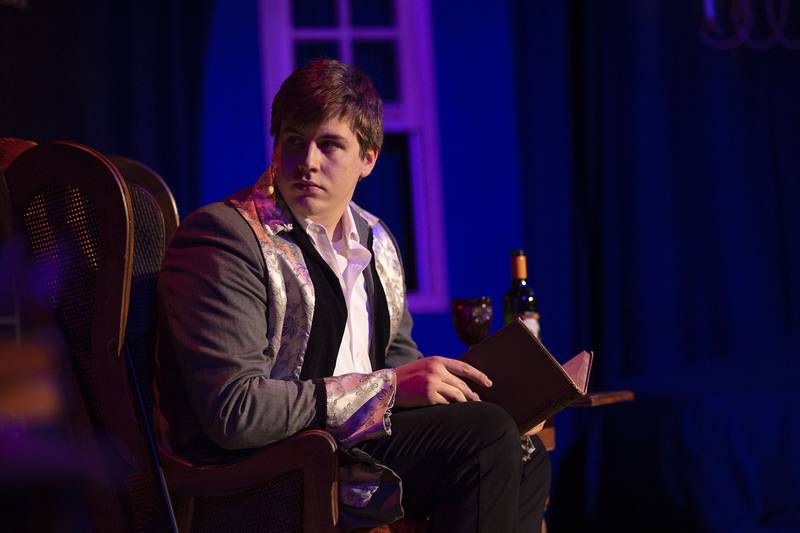 Maxwell George rehearses his part in Poe’s “The Raven” on Tuesday, Oct. 7, 2025, for the Performing Arts Guild's latest play.
