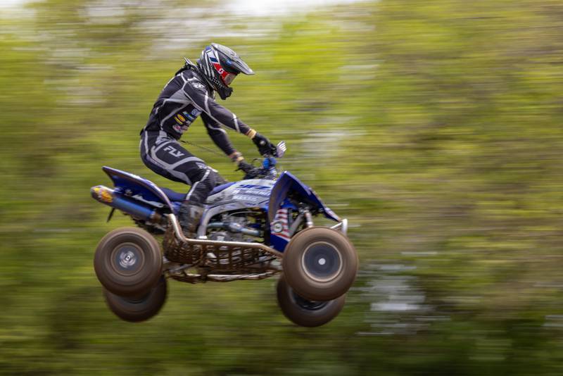 Illinois Pro racer, Chad Wienen of Galena, maintains his third place position in the back portion of the track during the ATVMX Championship race on May 24, 2025 at Sunset Ridge MX in Walnut.