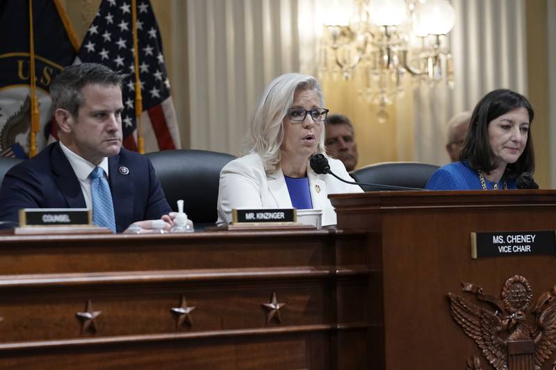 FILE - Vice Chair Liz Cheney, R-Wyo., speaks as the House select committee investigating the Jan. 6 attack on the U.S. Capitol holds a hearing at the Capitol in Washington, Thursday, July 21, 2022. Rep. Adam Kinzinger, R-Ill., left, and Rep. Elaine Luria, D-Va., right, listen. The House Jan. 6 committee will share 20 of its interview transcripts with the Justice Department as federal prosecutors have been increasingly focused on efforts by former President Donald Trump and his allies to overturn the results of the election. (AP Photo/J. Scott Applewhite, File)