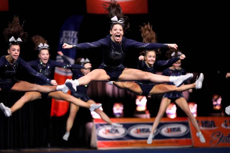 Members of the Cary-Grove cheerleading team compete in the medium team division of the IHSA State Finals on Saturday, Feb. 8, 2025 at Grossinger Motors Arena in Bloomington.